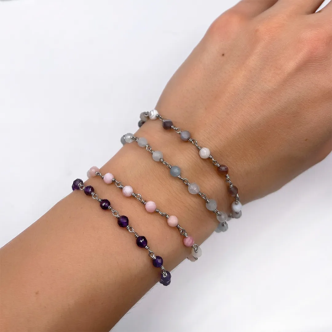 картинка Браслет из розового опала с плетением от магазина Beadsbrand