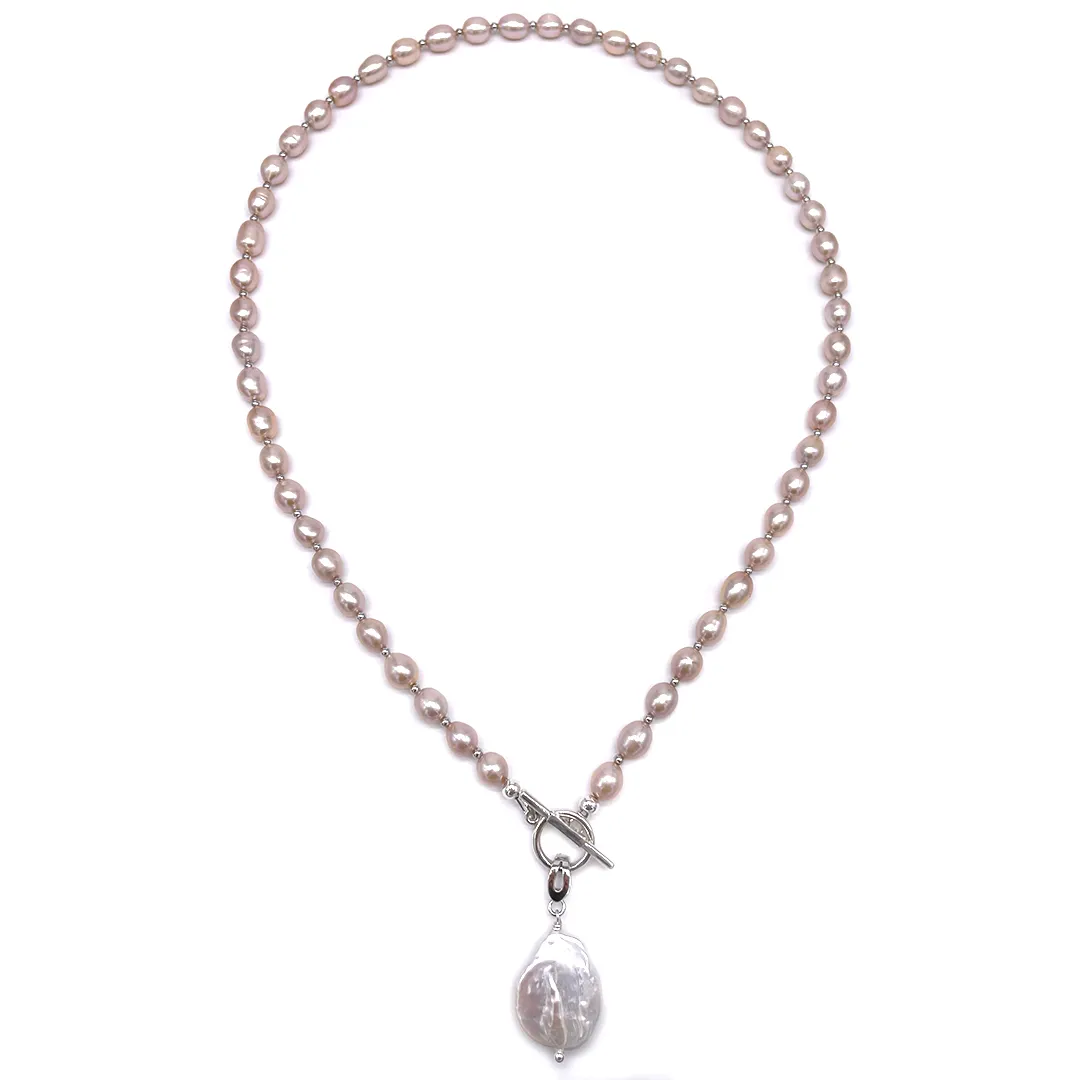 картинка Женское колье из персикового жемчуга с кулоном от магазина Beadsbrand